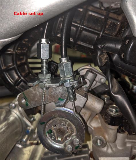 A magnifying glass. . Honda crf110f throttle limiter screw